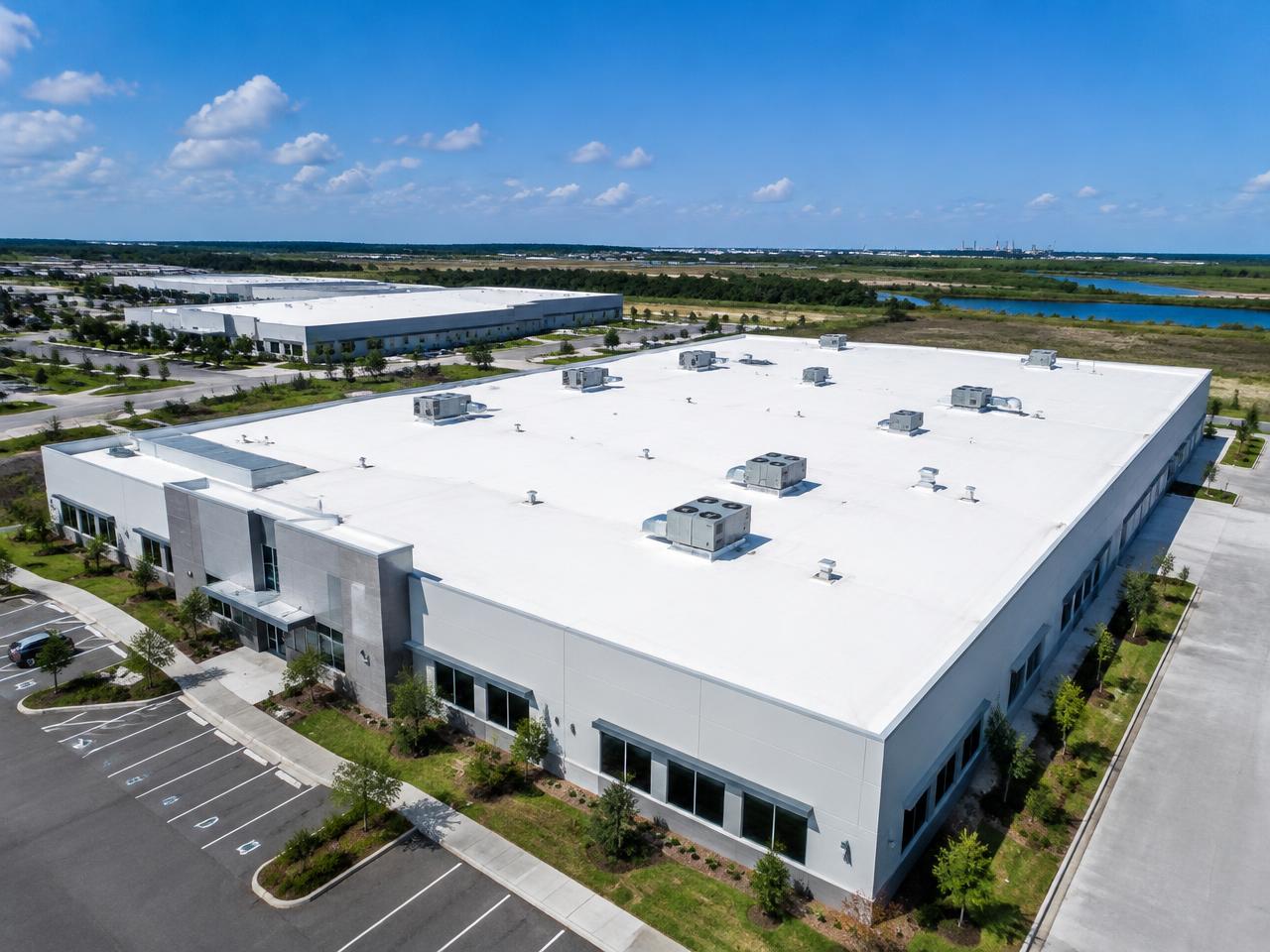 Commercial building with a new white flat roof